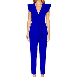 Adelyn Rae Cai Woven Ruffle Shoulder Jumpsuit